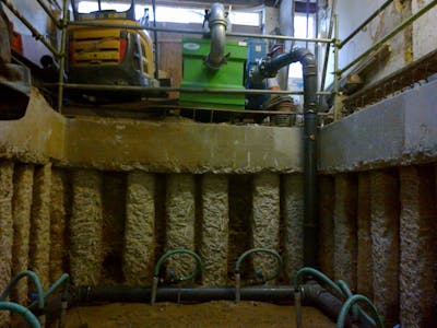Basement dewatering with tight access