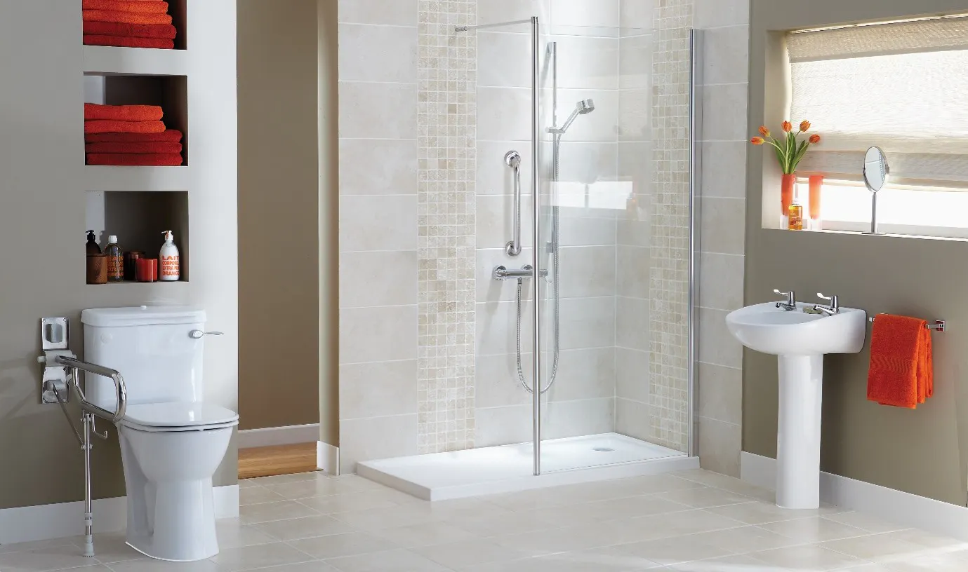 Accessible walk-in shower with grab rails, low-level shower tray and accessible toilet