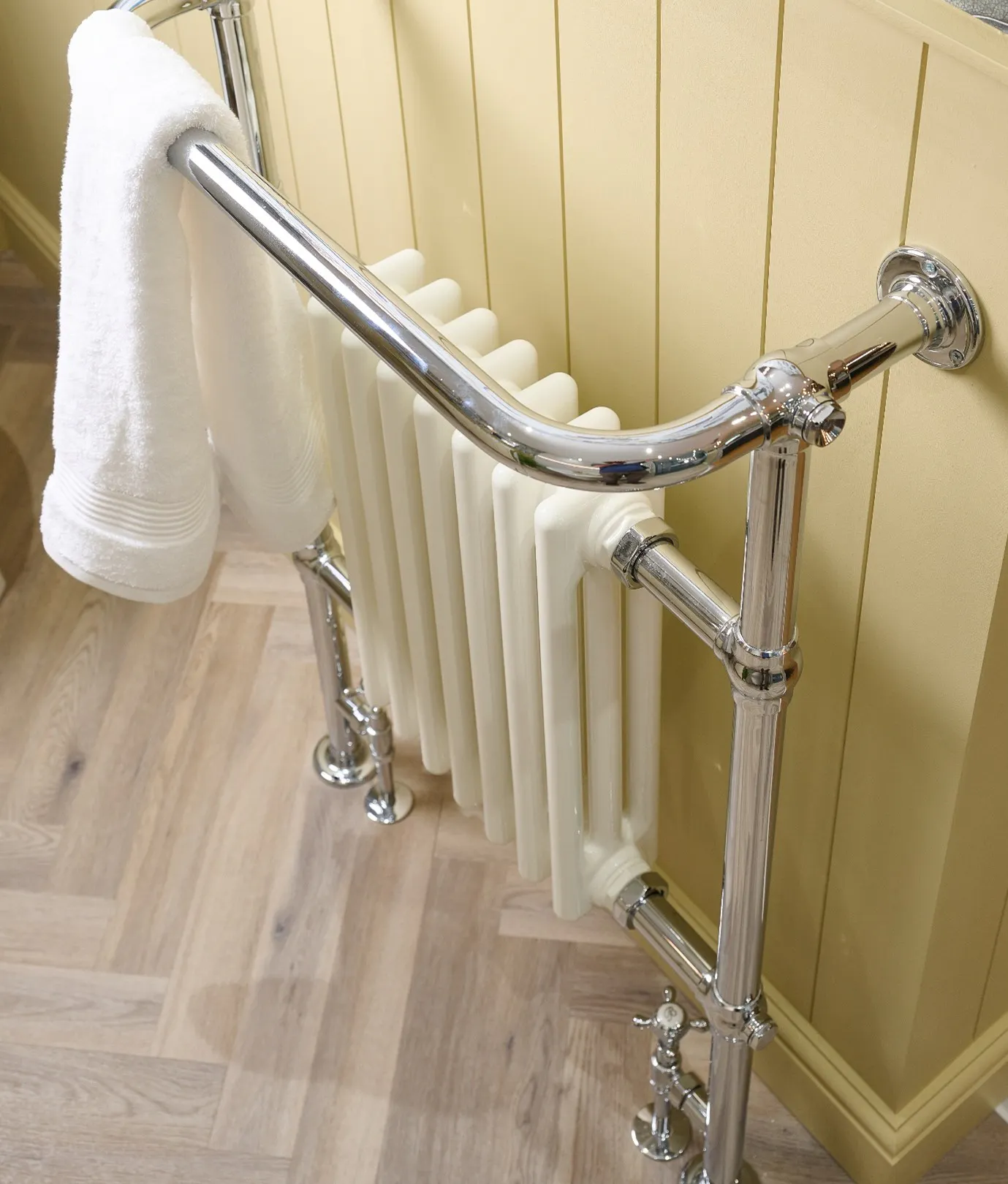Traditional bathroom radiator with chrome towel rail for efficient room heating