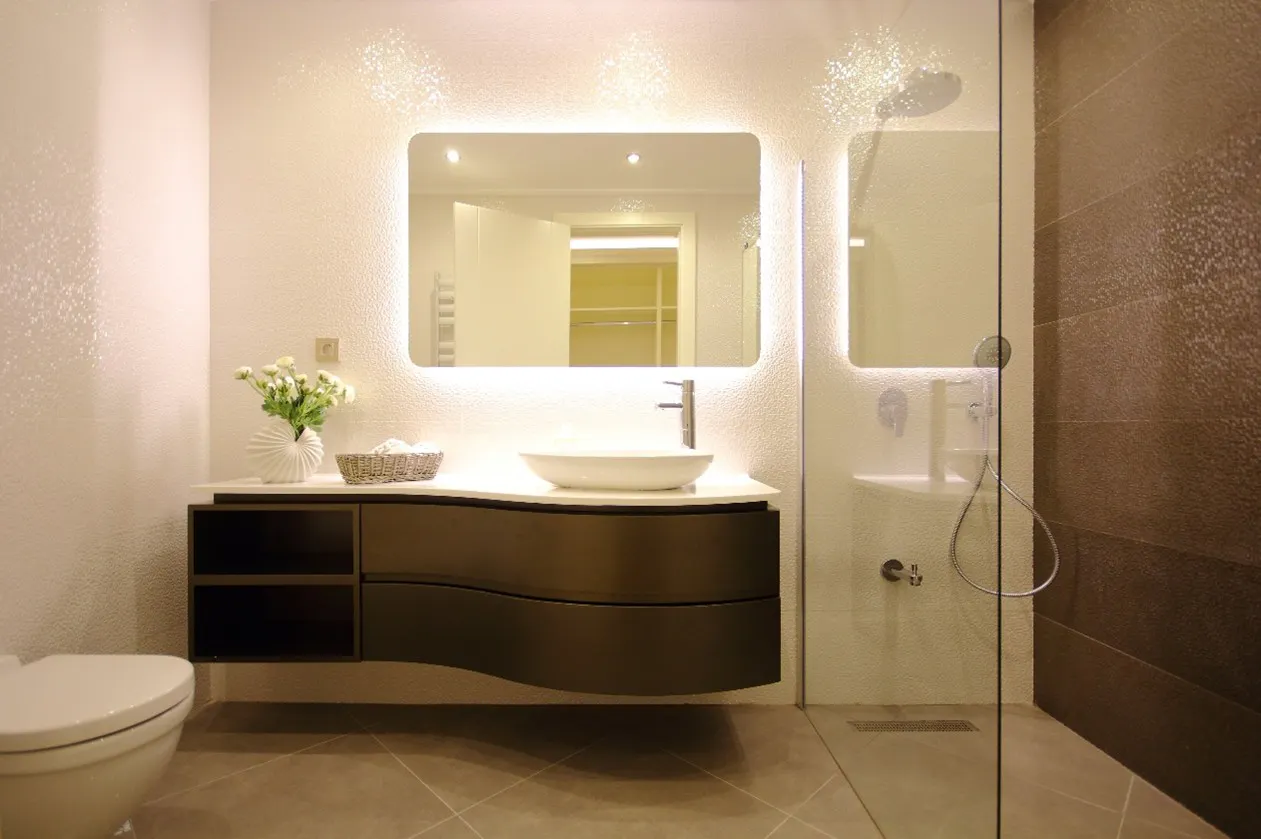 Luxury en-suite shower room with walk-in shower, floating vanity unit and LED mirror