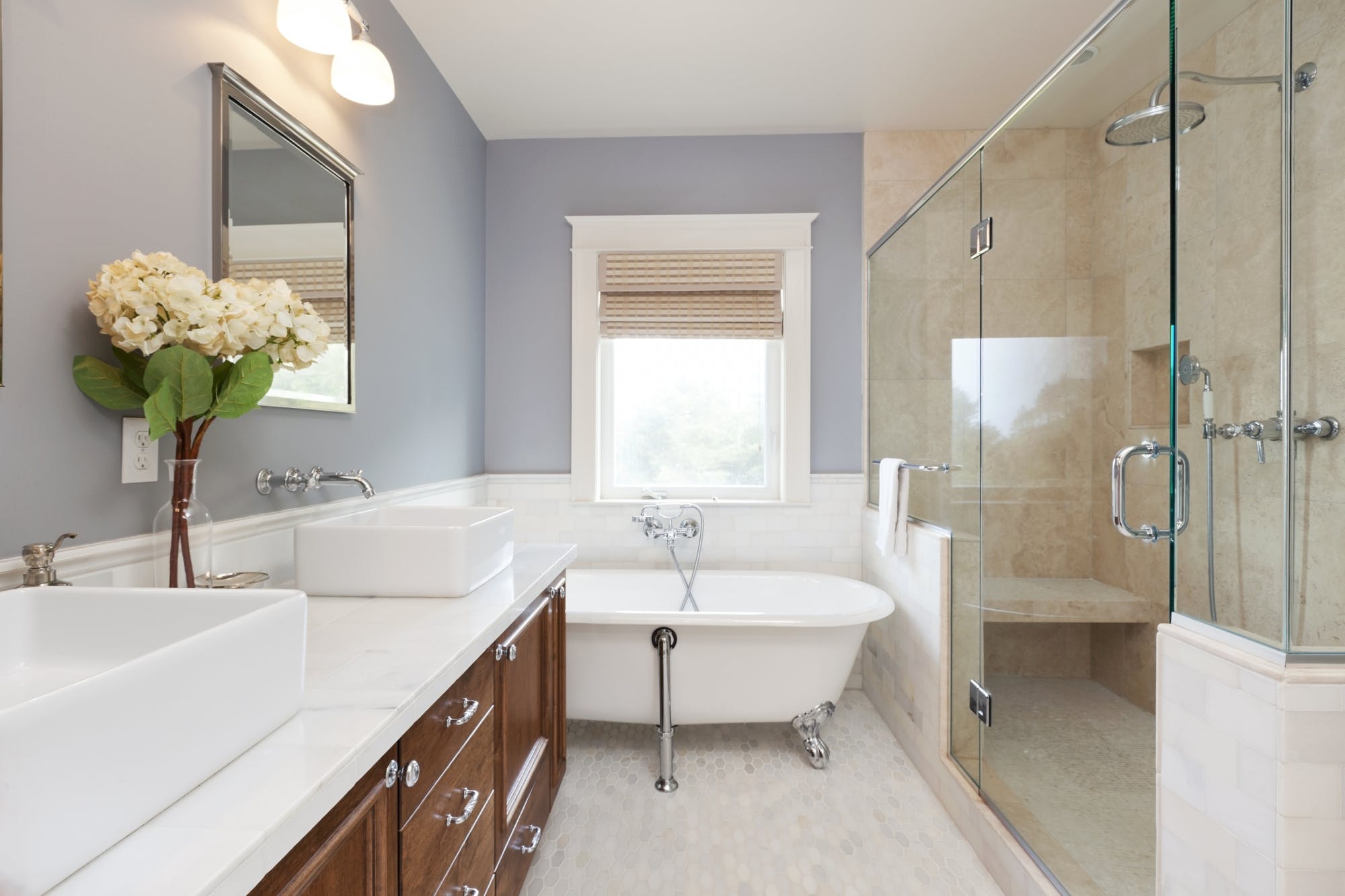 Bathroom With White Vanity Half Tile Wall