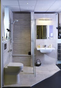 Stylish, easy access bath & shower rooms on display at our showroom.