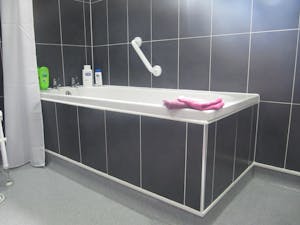 A safe & practical wet floor shower solution designed, supplied & installed