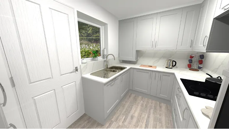 (Compact U-shaped light grey shaker kitchen with integrated oven and hob, double sink beneath a window, marble-effect worktops, and wood-style flooring)