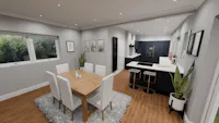 Modern dark blue shaker kitchen in Leeds with sociable peninsula, white quartz worktops and open-plan dining area